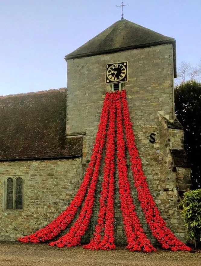 An AI generated mockup of the poppy project proposal showing five strands of poppies flowing from the St Mary's tower.